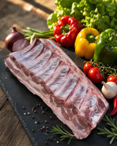 Cotlet cu os din catalogul Măcelăriei